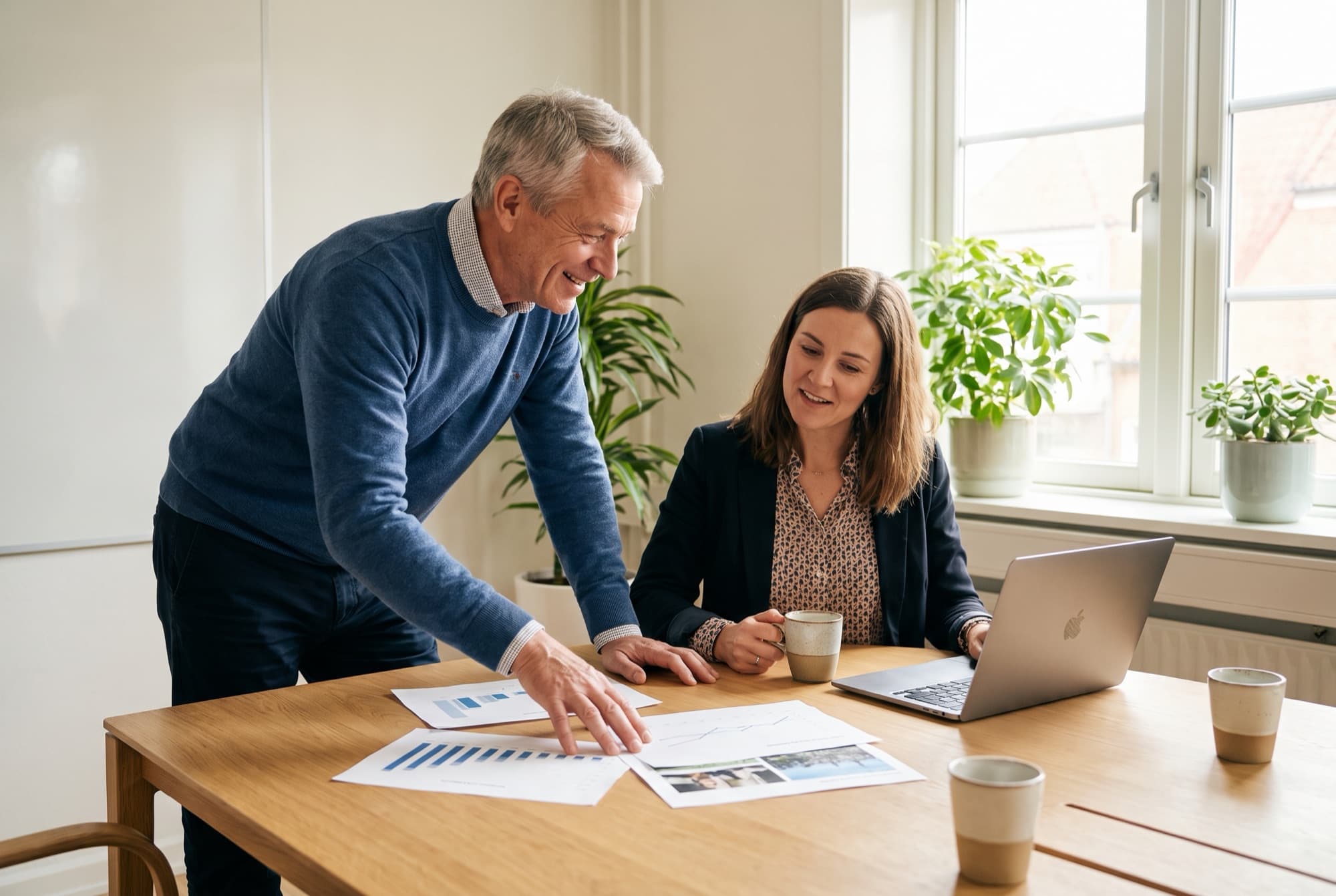 An advisor reviewing financials with a dentist